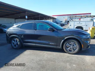 2022 Ford Mustang Mach-E Select with VIN 3FMTK1RM4NMA44540, listed as a IAAI auction lot 40825486 with 24,571 mi miles and . Bid and sale history available at DreamBid. Image 14.