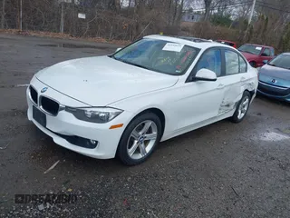 2013 BMW 3 Series 328i xDrive with VIN WBA3B5G5XDNS04574, listed as a IAAI auction lot 41935635 with 135,408 mi miles. Bid and sale history available at carsss.com. Image 2.