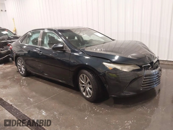 2015 Toyota Camry XLE with VIN 4T1BF1FK7FU906861, listed as a IAAI auction lot 41753920 with 92,389 mi miles and . Bid and sale history available at DreamBid. Image 1.