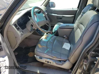 1997 Ford Explorer XLT with VIN 1FMDU35P5VZB51640, listed as a Copart auction lot 52030474 with 214,647 mi miles and Clean title. Bid and sale history available at DreamBid. Image 7.