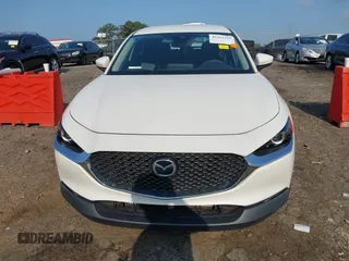 2021 Mazda CX-30 S with VIN 3MVDMAAL8MM262452, listed as a IAAI auction lot 42411325 with 38,440 mi miles and . Bid and sale history available at DreamBid. Image 12.