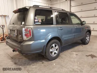 2007 Honda Pilot EX-L with VIN 2HKYF187X7H528523, listed as a IAAI auction lot 40977045 with 139,463 mi miles. Bid and sale history available at carsss.com. Image 4.