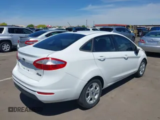 2014 Ford Fiesta SE with VIN 3FADP4BJ0EM172033, listed as a IAAI auction lot 42153874 with 155,640 mi miles. Bid and sale history available at carsss.com. Image 4.