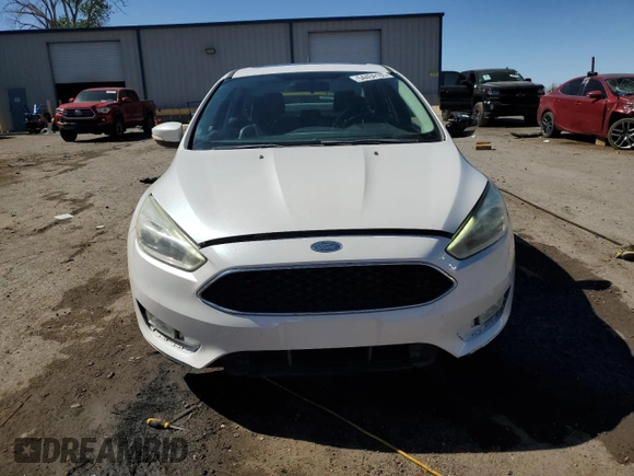 2015 Ford Focus Titanium with VIN 1FADP3J23FL300126, listed as a Copart auction lot 54434165 with 176,526 mi miles and Salvage title. Bid and sale history available at DreamBid. Image 5.