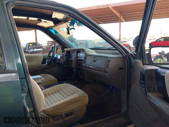 1994 Jeep Grand Cherokee Laredo with VIN 1J4GZ58S4RC280650, listed as a IAAI auction lot 42041261 with 199,265 mi miles and . Bid and sale history available at DreamBid. Image 5.