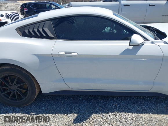 2018 Ford Mustang EcoBoost z VIN 1FA6P8TH9J5101182, wystawiony jako IAAI lot #41847168 z przebiegiem 98 168 mil mil oraz . Historia ofert i sprzedaży dostępna na DreamBid. Obrazek 14.