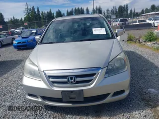 2006 Honda Odyssey EX-L z VIN 5FNRL38726B428227, wystawiony jako IAAI lot #42381464 z przebiegiem 156 623 mil mil oraz . Historia ofert i sprzedaży dostępna na DreamBid. Obrazek 13.