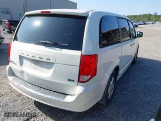 2013 Dodge Grand Caravan SXT with VIN 2C4RDGCG3DR537051, listed as a IAAI auction lot 41919188 with 180,524 mi miles. Bid and sale history available at carsss.com. Image 4.