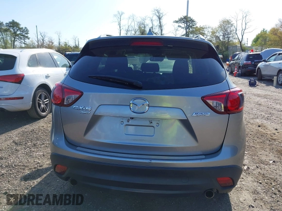 2014 Mazda CX-5 Touring with VIN JM3KE4CY0E0302583, listed as a IAAI auction lot 41947735 with 122,077 mi miles. Bid and sale history available at carsss.com. Image 16.