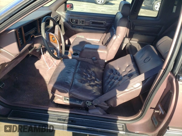 1988 Cadillac Eldorado with VIN 1G6EL1153JU632470, listed as a Copart auction lot 78507684 with 176,894 mi miles and Salvage Title. Bid and sale history available at DreamBid. Image 7.