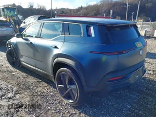 2023 Fisker Ocean One z VIN VCF1ZBU29PG005796, wystawiony jako IAAI lot #41136320 z przebiegiem 14 032 mil mil oraz . Historia ofert i sprzedaży dostępna na DreamBid. Obrazek 3.