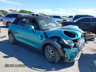 2016 MINI Convertible z VIN WMWWG5C5XG3A83276, wystawiony jako IAAI lot #41864830 z przebiegiem 103 721 mil mil oraz . Historia ofert i sprzedaży dostępna na DreamBid. Obrazek 1.