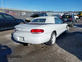 1996 Chrysler Sebring JXi with VIN 3C3EL55H6TT310724, listed as a IAAI auction lot 41424560 with Not Provided miles and . Bid and sale history available at DreamBid. Image 4.