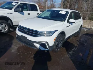 2022 Volkswagen Tiguan S with VIN 3VV0B7AX1NM035831, listed as a IAAI auction lot 41130297 with 64,298 mi miles. Bid and sale history available at carsss.com. Image 2.