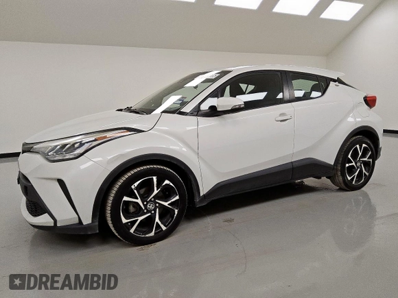2021 Toyota C-HR LE z VIN NMTKHMBX0MR120577, wystawiony jako Copart lot #57019105 z przebiegiem 152 488 mil mil oraz Czysty tytuł • Clean title. Historia ofert i sprzedaży dostępna na DreamBid. Obrazek 1.