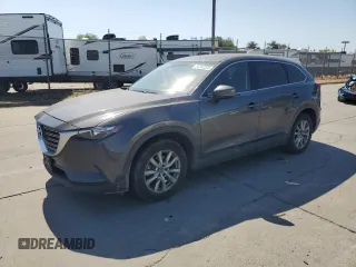 2016 Mazda CX-9 Touring with VIN JM3TCACY1G0108947, listed as a Copart auction lot 58562225 with 86,014 mi miles and Salvage title. Bid and sale history available at DreamBid. Image 1.