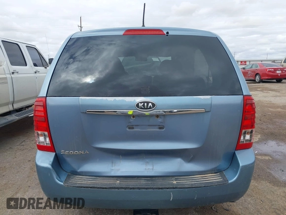 2011 Kia Sedona LX with VIN KNDMG4C70B6424016, listed as a IAAI auction lot 41964190 with 116,859 mi miles. Bid and sale history available at carsss.com. Image 16.