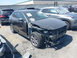 2021 Mazda CX-30 Select z VIN 3MVDMABL4MM205308, wystawiony jako IAAI lot #42179141 z przebiegiem 63 070 mil mil oraz . Historia ofert i sprzedaży dostępna na DreamBid. Obrazek 1.