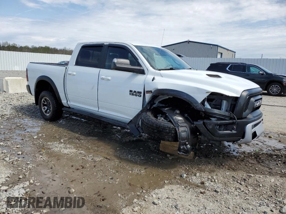 2017 Ram 1500 Rebel z VIN 1C6RR6YT2HS693644, wystawiony jako Copart lot #52570215 z przebiegiem 127 023 mil mil oraz Nie do naprawy • Non repairable. Historia ofert i sprzedaży dostępna na DreamBid. Obrazek 4.