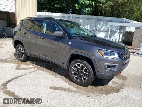 2021 Jeep Compass Trailhawk with VIN 3C4NJDDB7MT598280, listed as a Copart auction lot 58241695 with 116,928 mi miles and Salvage title. Bid and sale history available at DreamBid. Image 4.