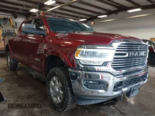 2019 Ram 2500 Laramie with VIN 3C6UR5NL0KG520647, listed as a IAAI auction lot 41655315 with 157,829 mi miles and . Bid and sale history available at DreamBid. Image 1.