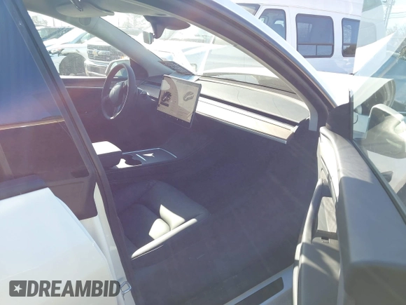 2025 Tesla Model Y Long Range with VIN 7SAYGDED9SA342374, listed as a IAAI auction lot 41663085 with 4,115 mi miles and . Bid and sale history available at DreamBid. Image 5.