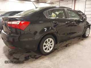 2014 Kia Rio LX with VIN KNADM4A32E6409785, listed as a IAAI auction lot 41810262 with 183,669 mi miles. Bid and sale history available at carsss.com. Image 4.