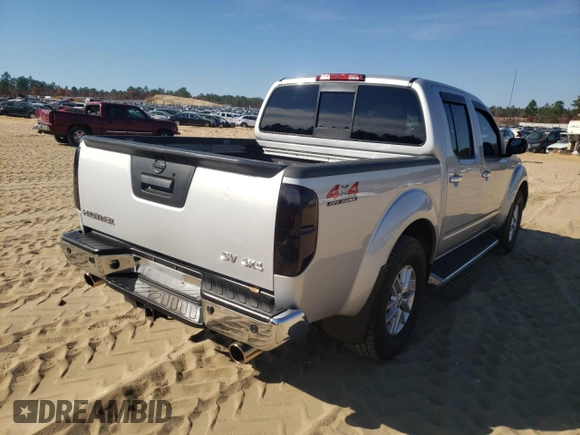 2015 Nissan Frontier S with VIN 1N6AD0EV0FN713325, listed as a Copart auction lot 62076541 with 40,289 mi miles and Salvage title. Bid and sale history available at DreamBid. Image 4.