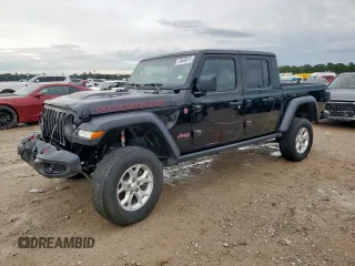 2021 Jeep Gladiator Rubicon z VIN 1C6JJTBG7ML536792, wystawiony jako Copart lot #58849315 z przebiegiem 50 247 mil mil oraz Szkoda całkowita • Salvage title. Historia ofert i sprzedaży dostępna na DreamBid. Obrazek 1.