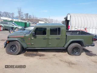 2023 Jeep Gladiator Mojave with VIN 1C6JJTEG6PL564504, listed as a IAAI auction lot 41752685 with 20,430 mi miles and . Bid and sale history available at DreamBid. Image 14.