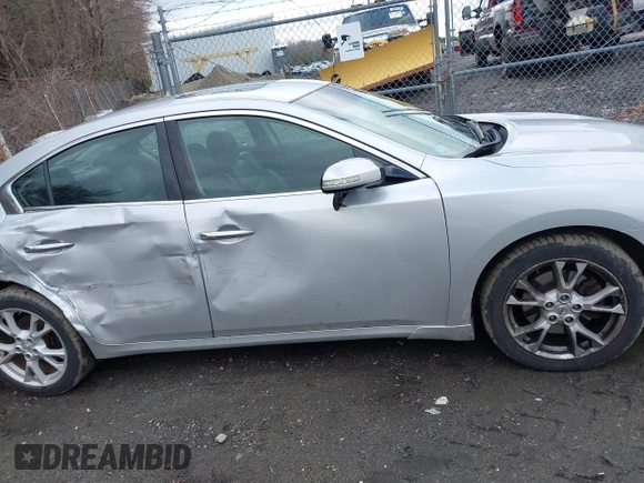 2013 Nissan Maxima S with VIN 1N4AA5AP0DC838596, listed as a IAAI auction lot 41992360 with 117,096 mi miles and . Bid and sale history available at DreamBid. Image 14.
