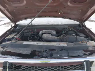 2000 Ford F-150 XL with VIN 1FTRX18L2YNA50128, listed as a IAAI auction lot 40956879 with 1 mi miles. Bid and sale history available at carsss.com. Image 10.