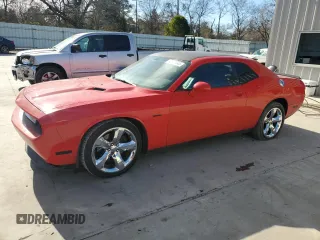 2013 Dodge Challenger R/T with VIN 2C3CDYBTXDH728695, listed as a Copart auction lot 42777345 with 140,696 mi miles and Salvage Title. Bid and sale history available at carsss.com. Image 1.