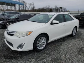 2014 Toyota Camry SE with VIN 4T1BK1FK2EU542746, listed as a Copart auction lot 48057825 with 112,547 mi miles and Salvage Title. Bid and sale history available at carsss.com. Image 1.