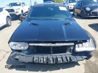 2014 Dodge Challenger R/T with VIN 2C3CDYBT8EH280622, listed as a IAAI auction lot 41973994 with 86,983 mi miles and . Bid and sale history available at DreamBid. Image 13.