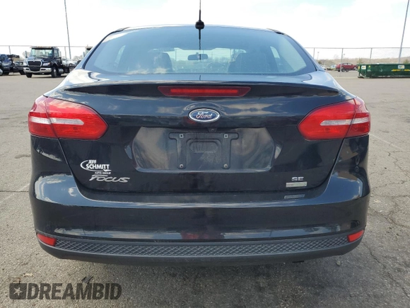 2018 Ford Focus SE with VIN 1FADP3FEXJL215912, listed as a Copart auction lot 50518385 with 100,080 mi miles and Salvage Title. Bid and sale history available at carsss.com. Image 6.