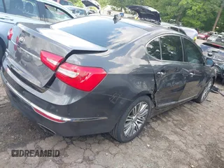 2016 Kia Cadenza Premium z VIN KNALN4D74G5218076, wystawiony jako IAAI lot #42123328 z przebiegiem 184 792 mil mil oraz . Historia ofert i sprzedaży dostępna na DreamBid. Obrazek 4.