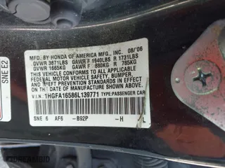 2006 Honda Civic Sdn LX with VIN 1HGFA16586L139771, listed as a IAAI auction lot 41894847 with 230,878 mi miles. Bid and sale history available at carsss.com. Image 9.