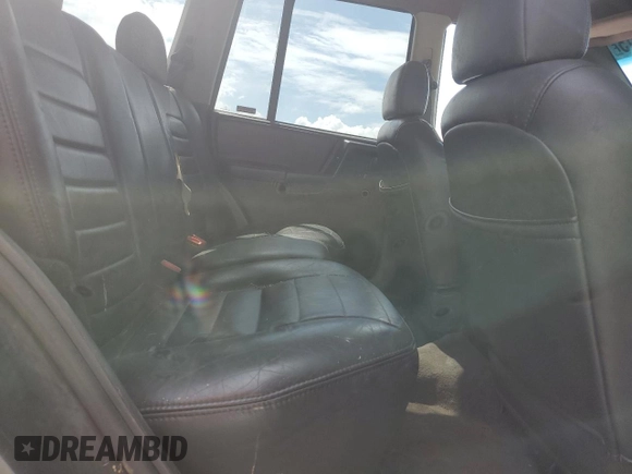 1998 Jeep Grand Cherokee Laredo with VIN 1J4GZ48S7WC222845, listed as a Copart auction lot 59576115 with Not provided miles and Clean title. Bid and sale history available at DreamBid. Image 10.