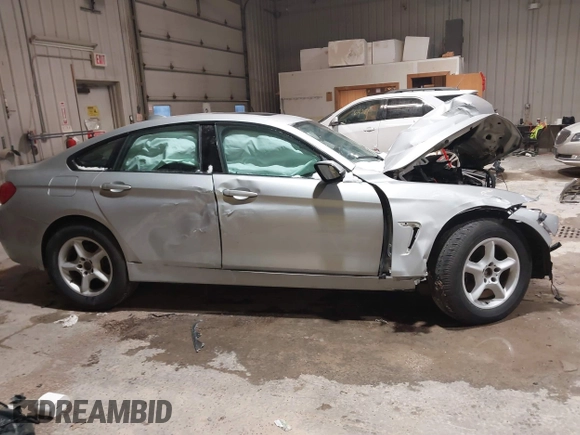 2015 BMW 4 Series 428i xDrive с VIN WBA4A7C50FD414523, выставлен на аукционе IAAI как лот 41092312 с пробегом Не указан миль и . История ставок и продаж доступна на DreamBid. Изображение 13.