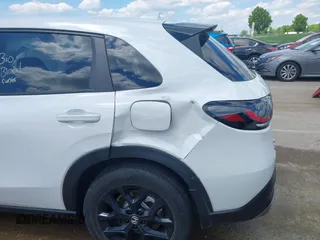 2024 Honda HR-V Sport with VIN 3CZRZ1H57RM761566, listed as a IAAI auction lot 42196492 with 12,113 mi miles and . Bid and sale history available at DreamBid. Image 12.