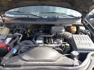 1999 Jeep Grand Cherokee Laredo with VIN 1J4GW58S6XC524451, listed as a IAAI auction lot 41741007 with 162,441 mi miles. Bid and sale history available at carsss.com. Image 10.