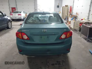 2010 Toyota Corolla z VIN 2T1BU4EE2AC517770, wystawiony jako IAAI lot #40742010 z przebiegiem 152 224 mil mil oraz . Historia ofert i sprzedaży dostępna na DreamBid. Obrazek 16.