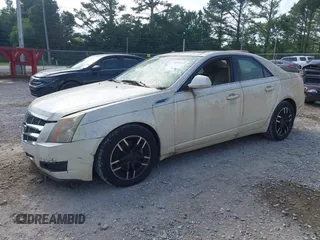2009 Cadillac CTS RWD with VIN 1G6DF577690108865, listed as a IAAI auction lot 42314121 with 153,702 mi miles and . Bid and sale history available at DreamBid. Image 2.