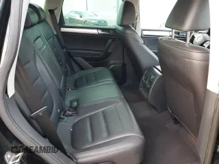 2012 Volkswagen Touareg Sport z VIN WVGEF9BP7CD006020, wystawiony jako Copart lot #88211145 z przebiegiem 180 729 mil mil oraz Szkoda całkowita • Salvage title. Historia ofert i sprzedaży dostępna na DreamBid. Obrazek 11.