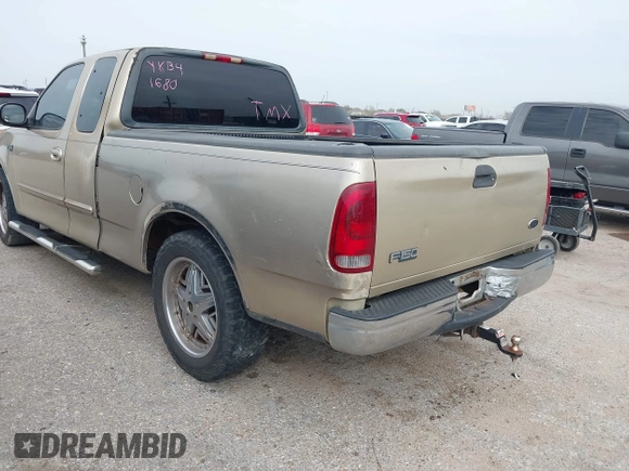 2000 Ford F-150 XL with VIN 1FTZX1725YKB41680, listed as a IAAI auction lot 41736655 with 1 mi miles. Bid and sale history available at carsss.com. Image 3.