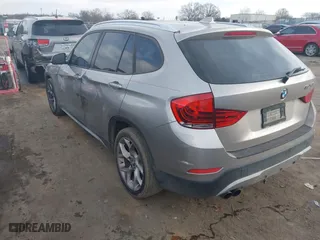 2014 BMW X1 sDrive28i with VIN WBAVM1C52EVW48857, listed as a IAAI auction lot 41179830 with 113,315 mi miles. Bid and sale history available at carsss.com. Image 3.