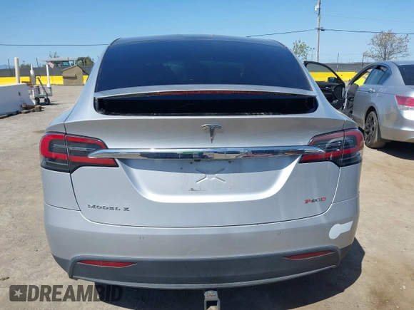 2016 Tesla Model X P90D with VIN 5YJXCAE49GF001067, listed as a IAAI auction lot 41980455 with 94,746 mi miles. Bid and sale history available at carsss.com. Image 16.