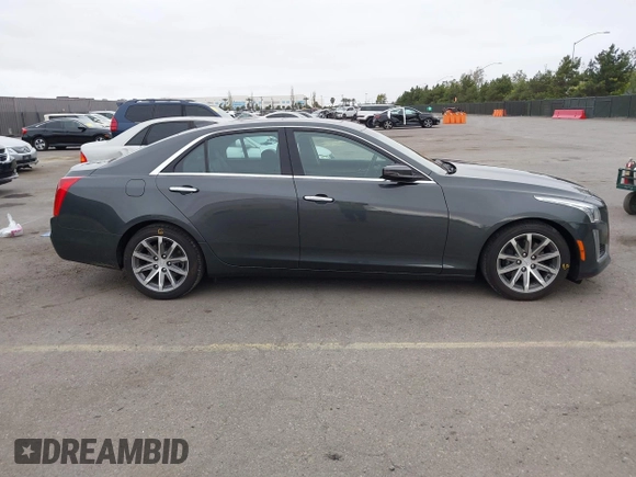 2016 Cadillac CTS Luxury Collection RWD z VIN 1G6AR5SX2G0144583, wystawiony jako IAAI lot #42194195 z przebiegiem 59 538 mil mil oraz . Historia ofert i sprzedaży dostępna na DreamBid. Obrazek 13.