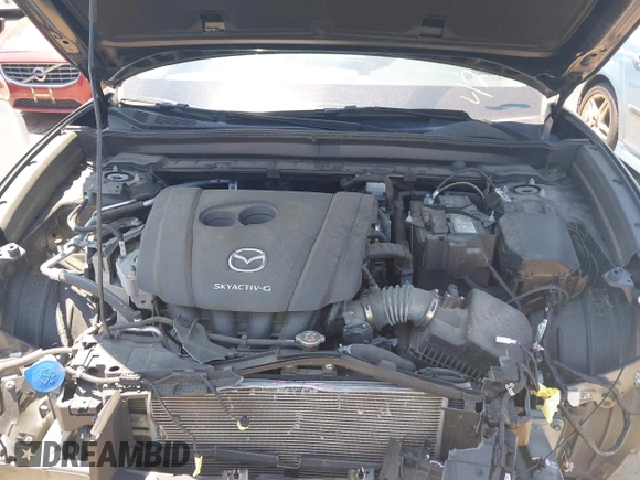 2022 Mazda CX-30 S Carbon Edition with VIN 3MVDMBCL3NM440188, listed as a IAAI auction lot 42259723 with 48,555 mi miles and . Bid and sale history available at DreamBid. Image 10.